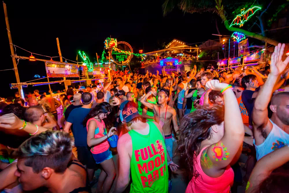 Crowd enjoying the Full Moon Party at the beach